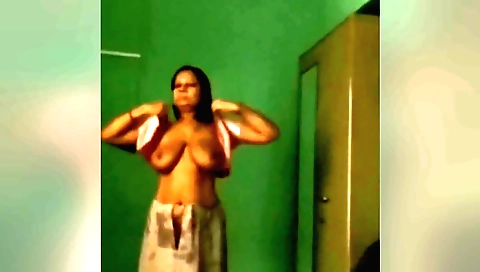 Cute blonde in amateur solo video showing her tits