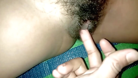 Hairy girl masturbates on a bed in homemade pov video