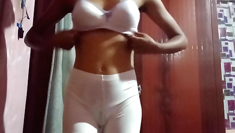 Indian chick with round boobs takes off the sexy dress and a sexy pose