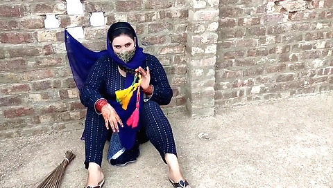 Indian chick is playing with her big black leather