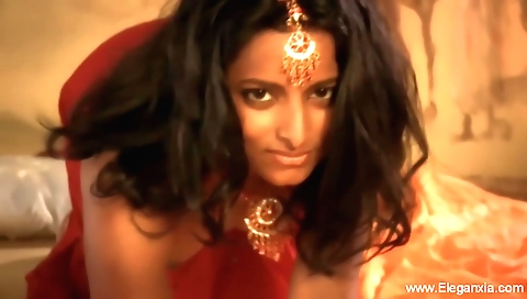 Indian milf in black dress and boots fucks on the massage table