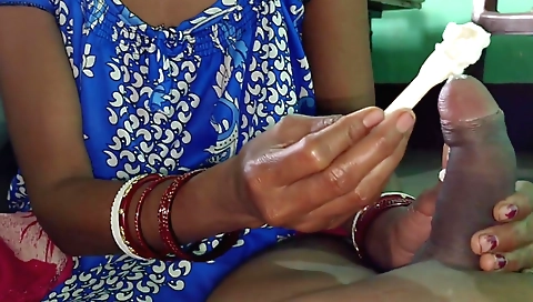 Indian chick in stockings is getting handjob done by ice cream