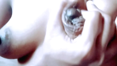 Busty lady with big boobs shows her full milked pussy