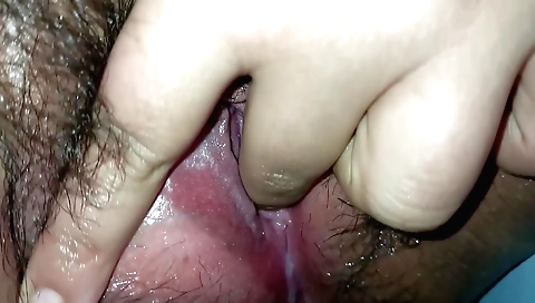 Indian milf with a sexy smile masturbating in her pussy