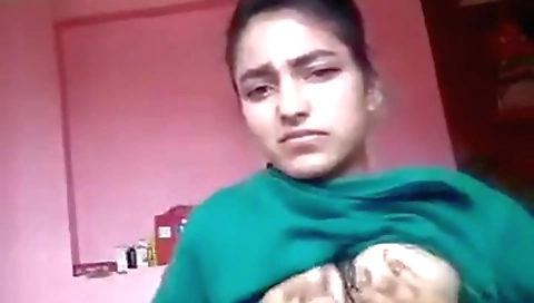 Slutty Indian girl with a hairy pussy is naked on the bed