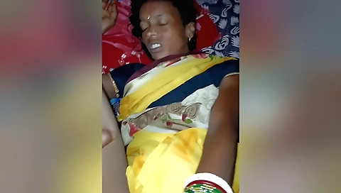 Indian woman with a hairy pussy playing with pussy on sofa