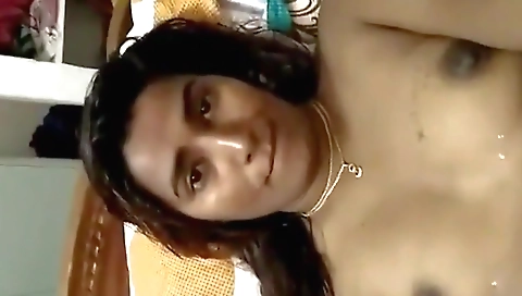 Sexy amateur in a sexy dress finger plays with her pussy