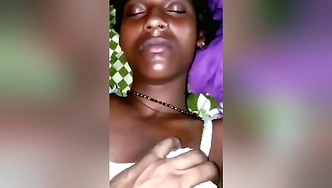 Brunette milf is showing her tight pussy to the viewer