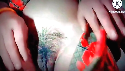 Naked woman masturbating on her phone in solo porn video