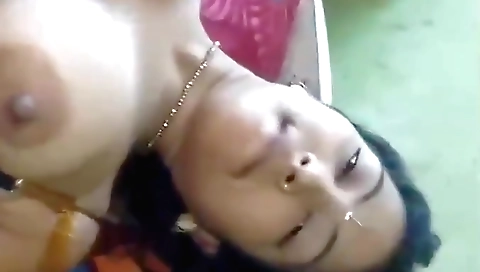 Indian brunette girl with big boobs is stripping naked