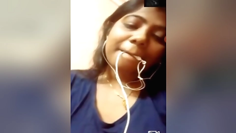 Sexy brunette in black lingerie shows her boobs on webcam