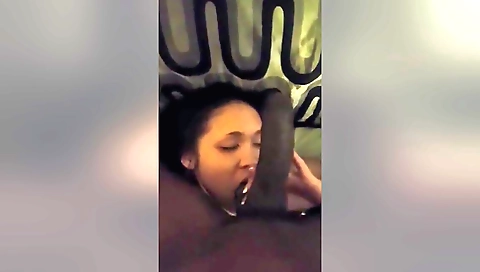 Amateur brunette is giving a handjob to her boyfriend