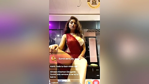 Sexy brunette in a sexy dress shows her beautiful body