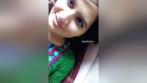 Brunette amateur chick in red dress fucked on webcam