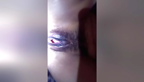 Indian hottie takes off her clothes and shows off her hairy pussy