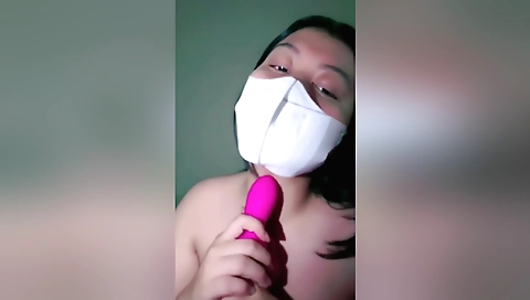Solo girl masturbates with vibrator inside her room
