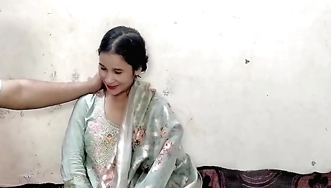 Indian brunette chick giving a handjob to her boyfriend