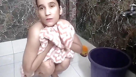 Indian girl strips naked in bathroom in a hot solo video