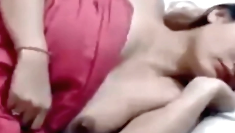 Sexy brunette is taking a shower and she is getting naked