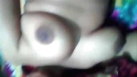 Female in bed masturbating while her doctor is on the phone