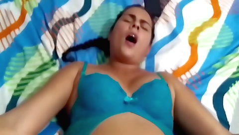 Stepmom with big tits and a sexy body plays with her phone