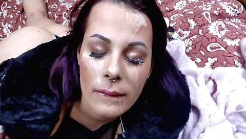 Brunette in sexy outfit is getting covered in semen