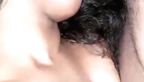 Brunette is giving a facial and cumming in front of camera